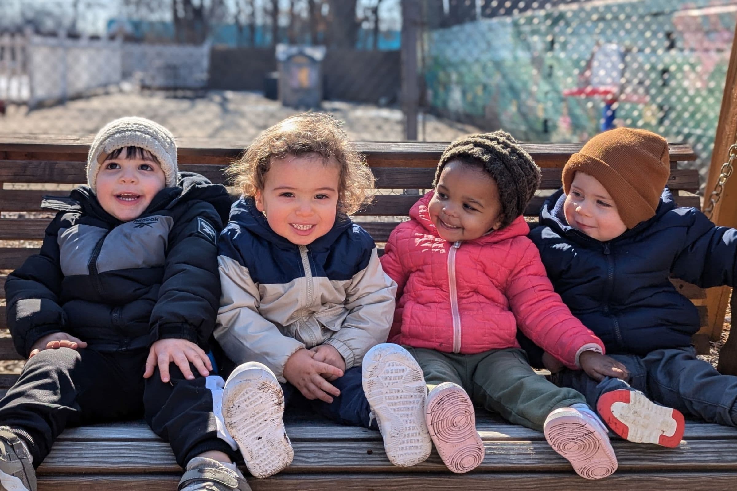 Children playing outside at Apples & Books Learning Center in Branchburg, NJ
